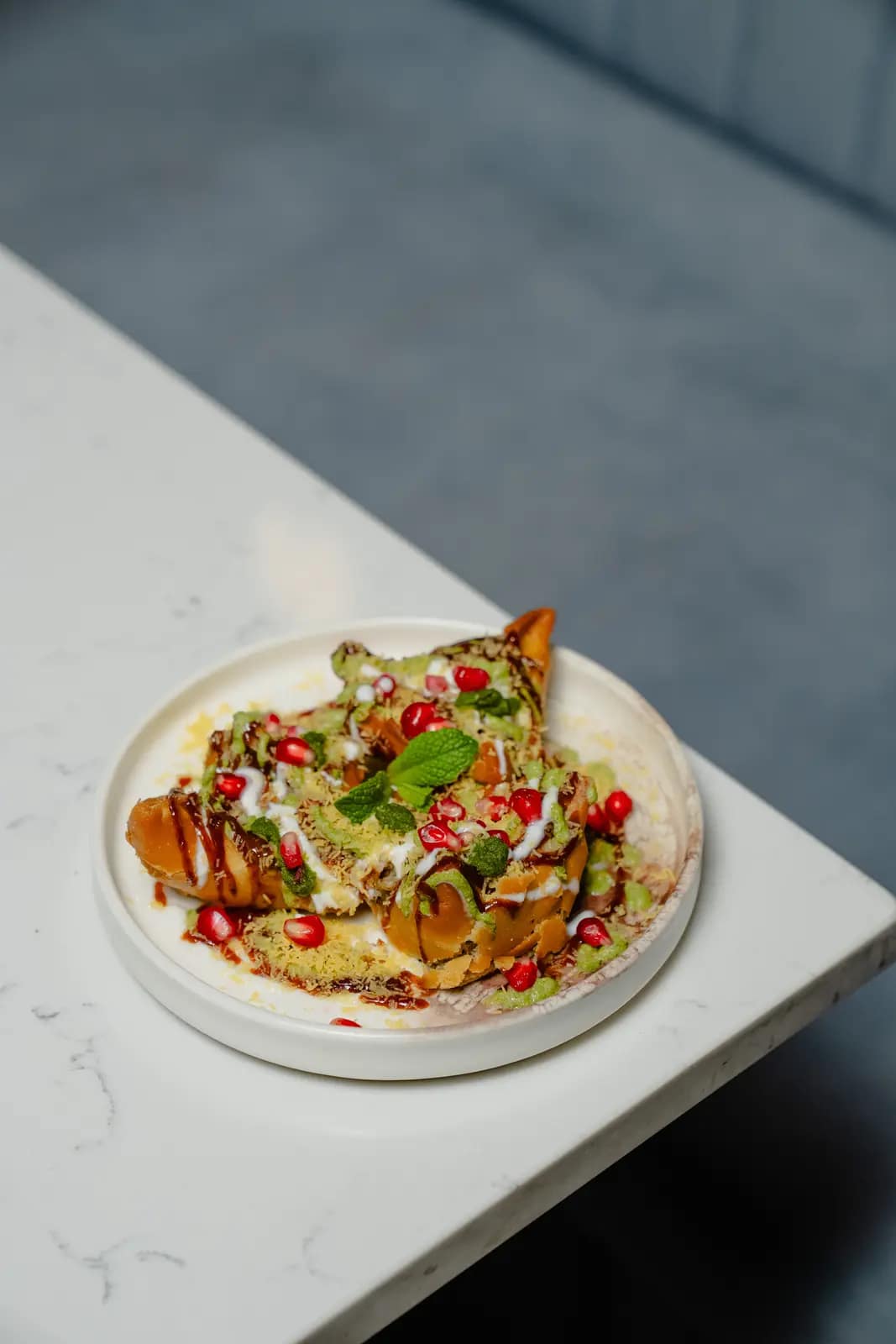 A plated Masakali dish ready to take away